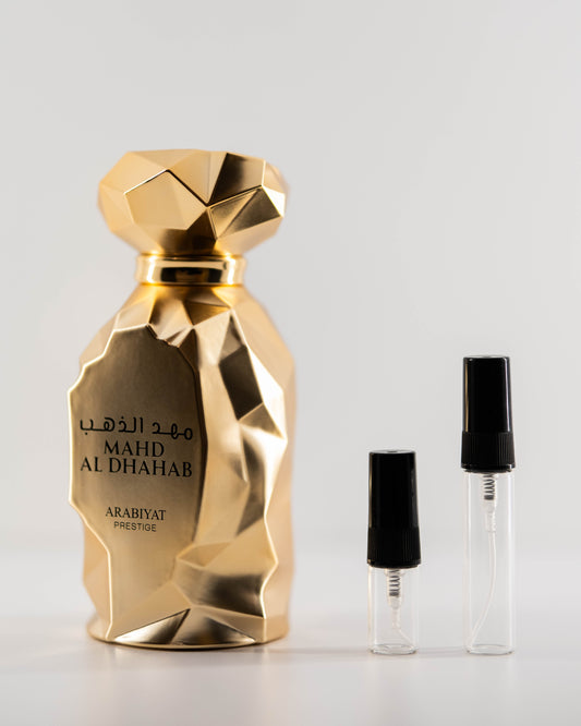 Mahd Al Dhahab with 2ml and 5ml decant bottles