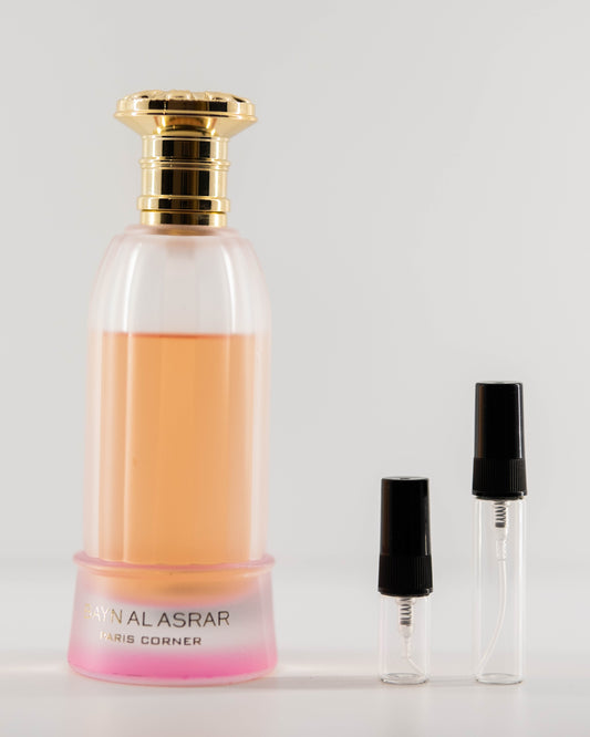 Bayn Al Asrar with 2ml and 5ml decant bottles