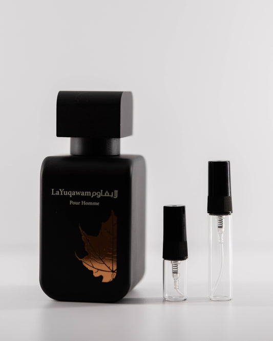 Rasasi La Yuqawam with 2ml and 5ml decant bottles