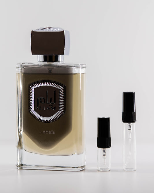 Liam Grey with 2ml and 5ml decant bottles