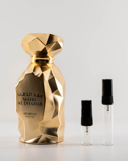 Mahd Al Dhahab with 2ml and 5ml decant bottles